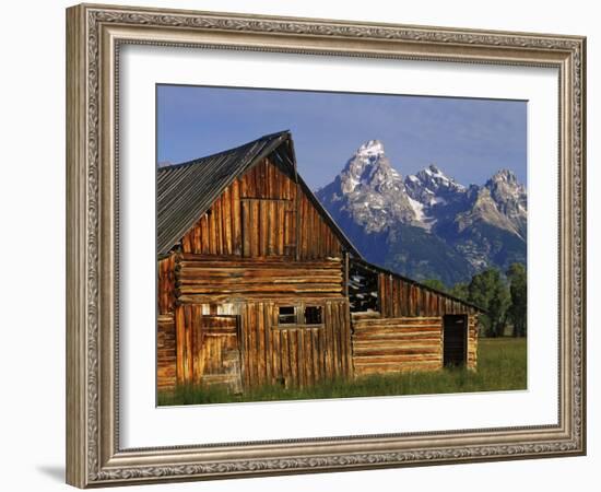 Weathered Wooden Barn Along Mormon Row with the Grand Tetons in Distance, Grand Teton National Park-Dennis Flaherty-Framed Photographic Print