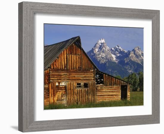 Weathered Wooden Barn Along Mormon Row with the Grand Tetons in Distance, Grand Teton National Park-Dennis Flaherty-Framed Photographic Print