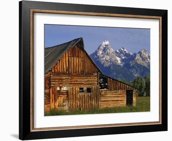 Weathered Wooden Barn Along Mormon Row with the Grand Tetons in Distance, Grand Teton National Park-Dennis Flaherty-Framed Photographic Print