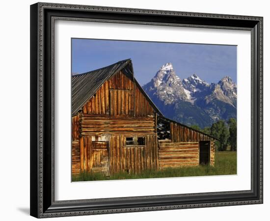 Weathered Wooden Barn Along Mormon Row with the Grand Tetons in Distance, Grand Teton National Park-Dennis Flaherty-Framed Photographic Print