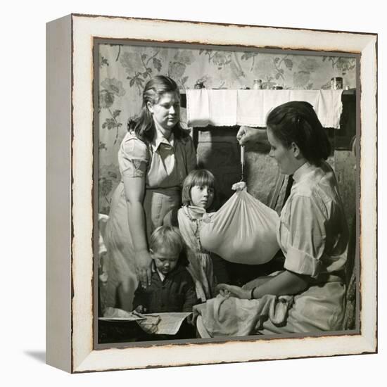 Weighing a Baby, Kentucky-null-Framed Premier Image Canvas