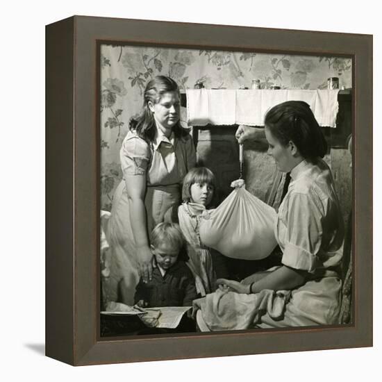 Weighing a Baby, Kentucky-null-Framed Premier Image Canvas