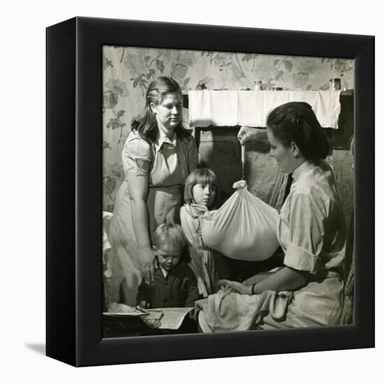 Weighing a Baby, Kentucky-null-Framed Premier Image Canvas