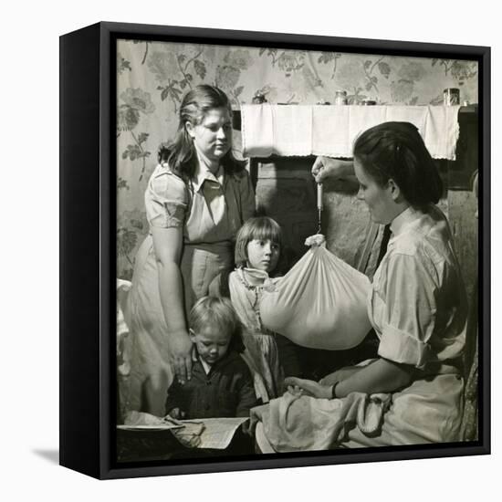 Weighing a Baby, Kentucky-null-Framed Premier Image Canvas
