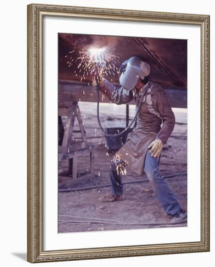 Welder at the Promecan Shipyard, Lima, Peru-Bill Ray-Framed Photographic Print