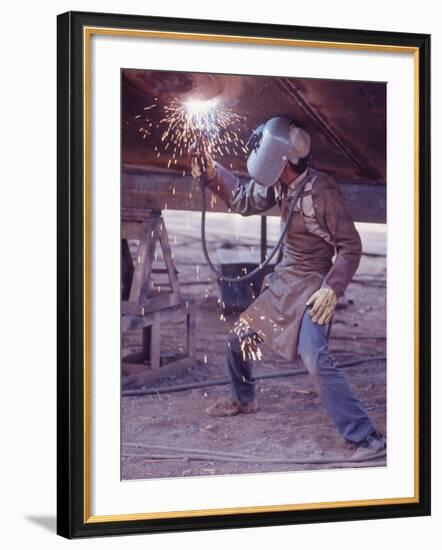 Welder at the Promecan Shipyard, Lima, Peru-Bill Ray-Framed Photographic Print