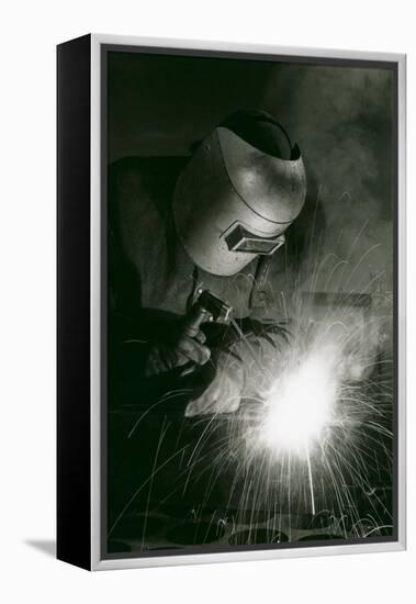 Welder in Mask-null-Framed Stretched Canvas