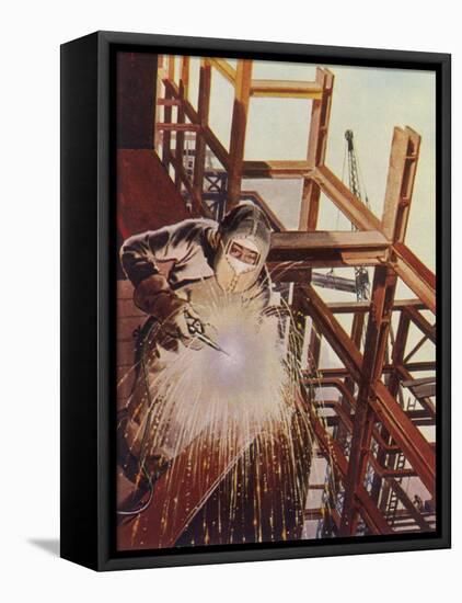 Welder Uses an Electric Arc- Welding Tool to Join the Metal Parts of a Steel Structure-null-Framed Premier Image Canvas