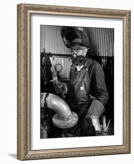 Welder Working in the Shipbuilding Industry-George Strock-Framed Photographic Print