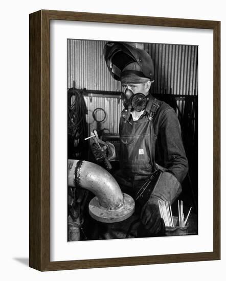 Welder Working in the Shipbuilding Industry-George Strock-Framed Photographic Print