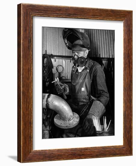 Welder Working in the Shipbuilding Industry-George Strock-Framed Photographic Print