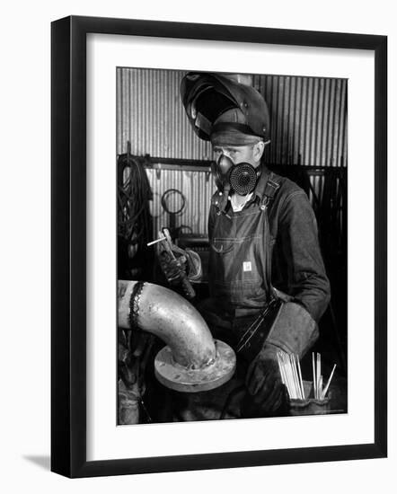 Welder Working in the Shipbuilding Industry-George Strock-Framed Photographic Print