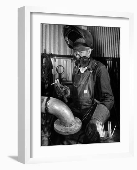 Welder Working in the Shipbuilding Industry-George Strock-Framed Photographic Print