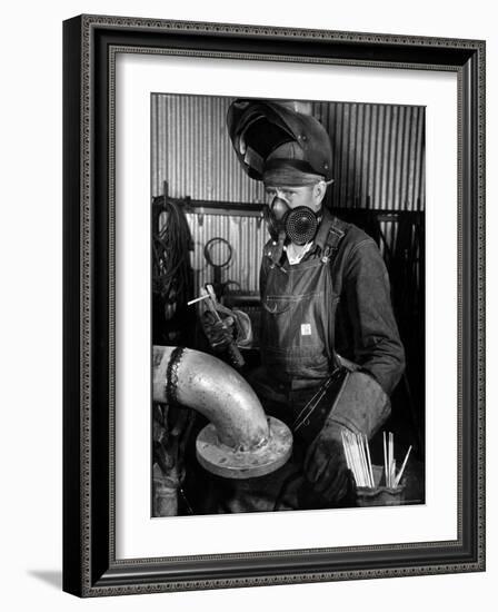 Welder Working in the Shipbuilding Industry-George Strock-Framed Photographic Print