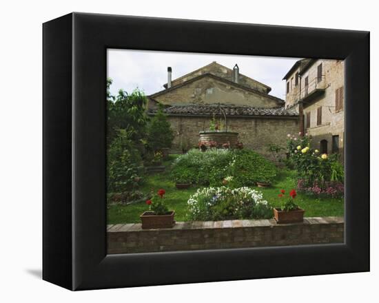 Well and Garden Courtyard, Buonconvento, Italy-Dennis Flaherty-Framed Premier Image Canvas