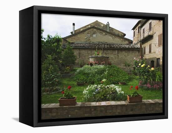 Well and Garden Courtyard, Buonconvento, Italy-Dennis Flaherty-Framed Premier Image Canvas