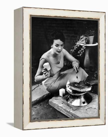 Well-Dressed Woman Cooking a Large Steak on the Aluminum Disposable Barbecue Grill-Peter Stackpole-Framed Premier Image Canvas