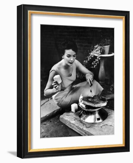 Well-Dressed Woman Cooking a Large Steak on the Aluminum Disposable Barbecue Grill-Peter Stackpole-Framed Photographic Print