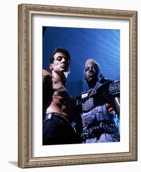 WESLEY SNIPES; SYLVESTER STALLONE. "Demolition Man" [1993], directed by MARCO BRAMBILLA.-null-Framed Photographic Print