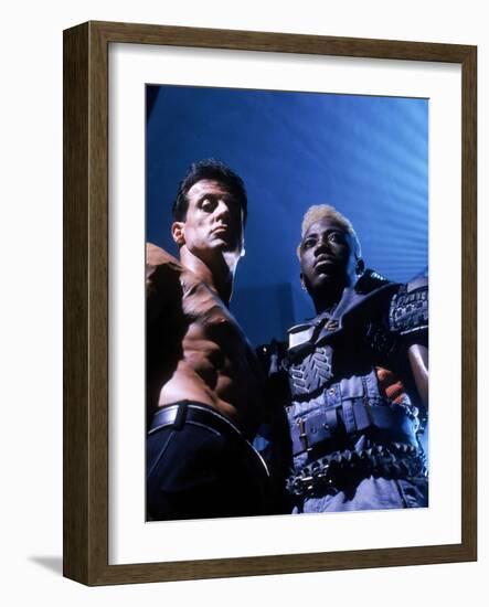 WESLEY SNIPES; SYLVESTER STALLONE. "Demolition Man" [1993], directed by MARCO BRAMBILLA.-null-Framed Photographic Print