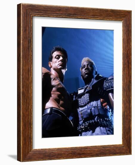 WESLEY SNIPES; SYLVESTER STALLONE. "Demolition Man" [1993], directed by MARCO BRAMBILLA.-null-Framed Photographic Print