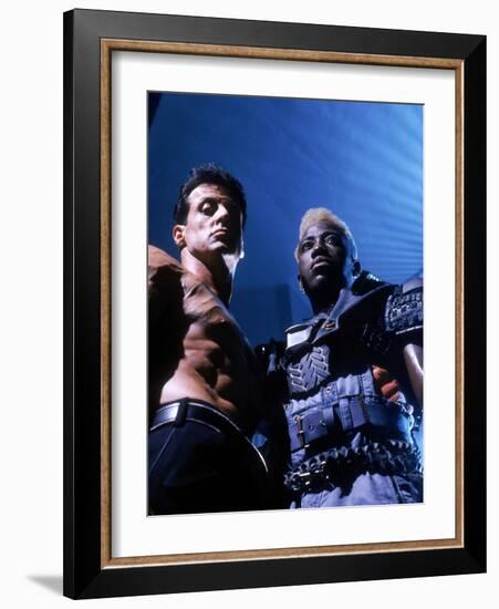 WESLEY SNIPES; SYLVESTER STALLONE. "Demolition Man" [1993], directed by MARCO BRAMBILLA.-null-Framed Photographic Print