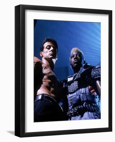 WESLEY SNIPES; SYLVESTER STALLONE. "Demolition Man" [1993], directed by MARCO BRAMBILLA.-null-Framed Photographic Print