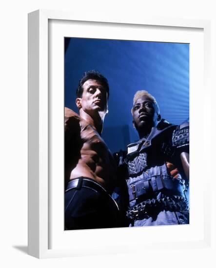 WESLEY SNIPES; SYLVESTER STALLONE. "Demolition Man" [1993], directed by MARCO BRAMBILLA.-null-Framed Photographic Print