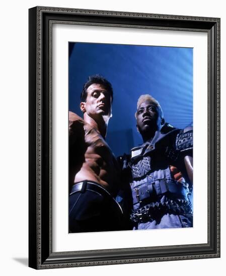 WESLEY SNIPES; SYLVESTER STALLONE. "Demolition Man" [1993], directed by MARCO BRAMBILLA.-null-Framed Photographic Print