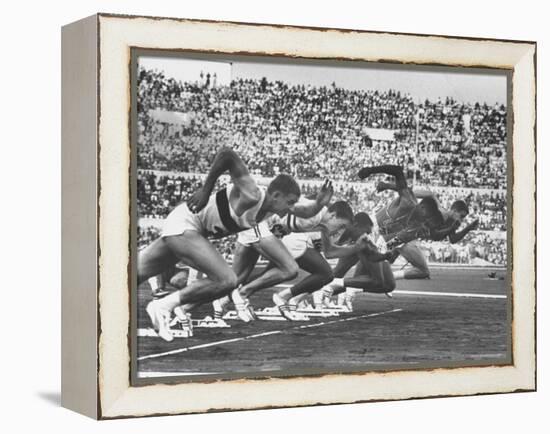 West Germany's Armin Harry, Winner of Men's 100 Meter Dash at Start of Event in Summer Olympics-George Silk-Framed Premier Image Canvas