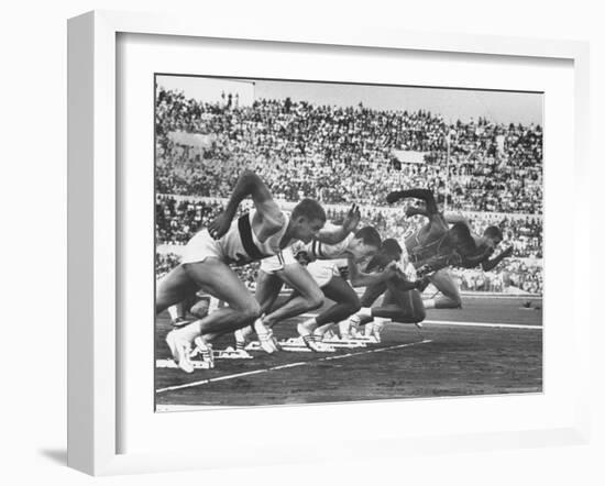 West Germany's Armin Harry, Winner of Men's 100 Meter Dash at Start of Event in Summer Olympics-George Silk-Framed Premium Photographic Print