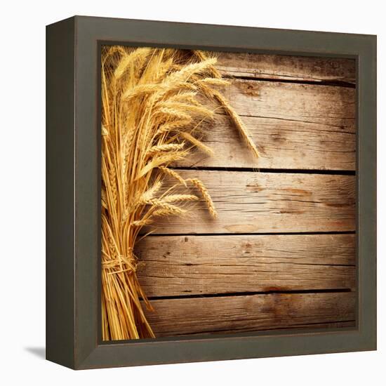 Wheat Ears on the Wooden Table, Sheaf of Wheat over Wood Background-Subbotina Anna-Framed Premier Image Canvas