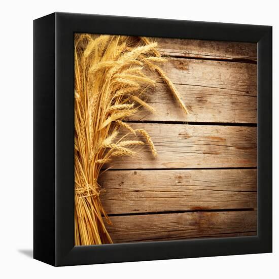 Wheat Ears on the Wooden Table, Sheaf of Wheat over Wood Background-Subbotina Anna-Framed Premier Image Canvas