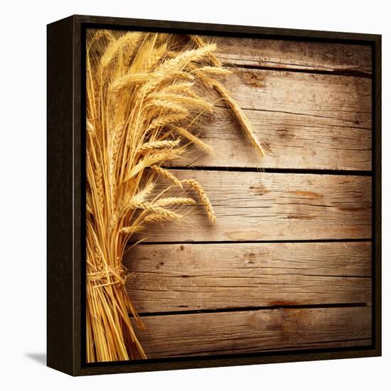 Wheat Ears on the Wooden Table, Sheaf of Wheat over Wood Background-Subbotina Anna-Framed Premier Image Canvas