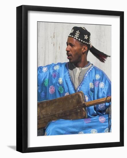 Whirling Dirvish Playes Instrument, Medina, Old City, Marrrakesh, Morocco-Jane Sweeney-Framed Photographic Print