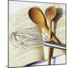 Whisk and Wooden Spoons on Recipe Book-Innerhofer Photodes-Mounted Photographic Print