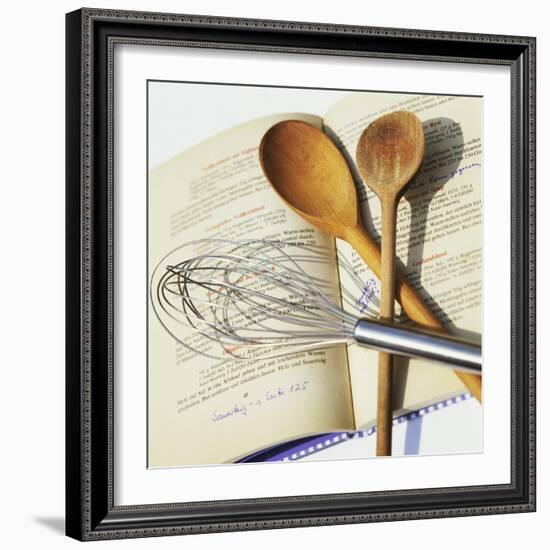 Whisk and Wooden Spoons on Recipe Book-Innerhofer Photodes-Framed Photographic Print