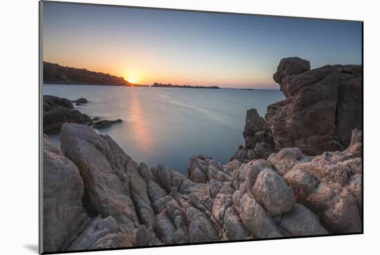 White cliffs and blue sea framed by the lights of sunset Santa Teresa di Gallura, Sardinia, Italy-Roberto Moiola-Mounted Photographic Print