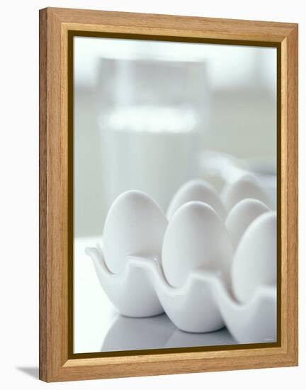 White Eggs in an Egg Holder-Alena Hrbkova-Framed Premier Image Canvas