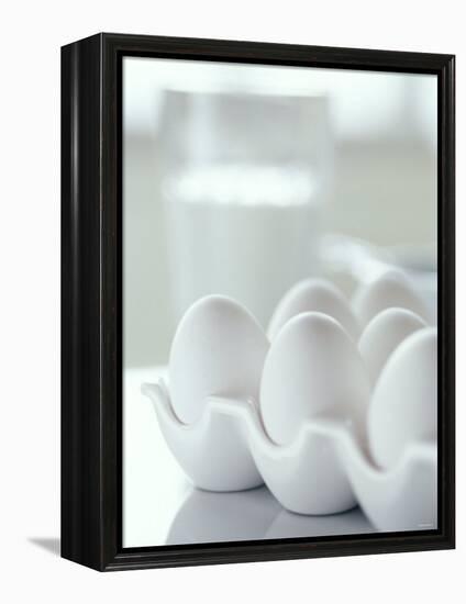 White Eggs in an Egg Holder-Alena Hrbkova-Framed Premier Image Canvas