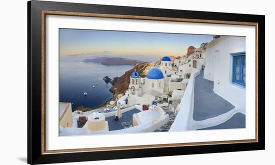 White Houses and Blue Domes of the Churches Dominate the Aegean Sea, Oia, Santorini-Roberto Moiola-Framed Photographic Print