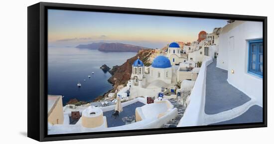 White Houses and Blue Domes of the Churches Dominate the Aegean Sea, Oia, Santorini-Roberto Moiola-Framed Premier Image Canvas