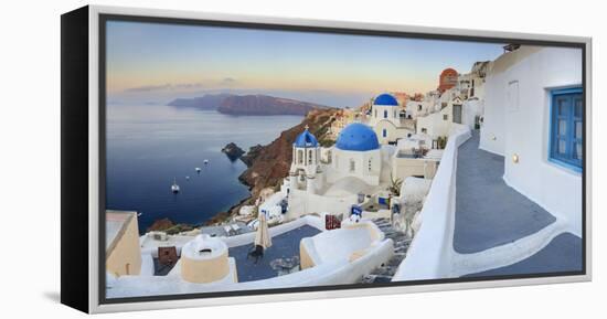 White Houses and Blue Domes of the Churches Dominate the Aegean Sea, Oia, Santorini-Roberto Moiola-Framed Premier Image Canvas