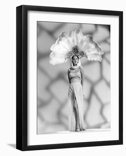 White Savage, Maria Montez, in a 'Sheerong' (Sheer Sarong) Designed by Vera West, 1943-null-Framed Photo