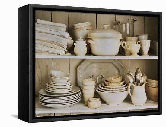White Tableware and Table Cloths on a Kitchen Shelf-Ellen Silverman-Framed Premier Image Canvas