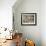 White Tableware and Table Cloths on a Kitchen Shelf-Ellen Silverman-Framed Photographic Print displayed on a wall