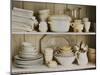 White Tableware and Table Cloths on a Kitchen Shelf-Ellen Silverman-Mounted Photographic Print