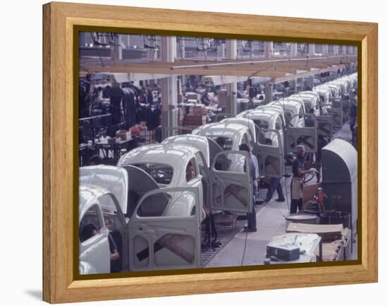 White Volkswagens Coming Down Assembly Line in Brazilian Factory-Paul Schutzer-Framed Premier Image Canvas