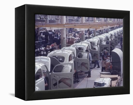 White Volkswagens Coming Down Assembly Line in Brazilian Factory-Paul Schutzer-Framed Premier Image Canvas