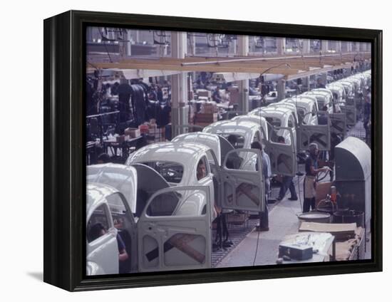 White Volkswagens Coming Down Assembly Line in Brazilian Factory-Paul Schutzer-Framed Premier Image Canvas